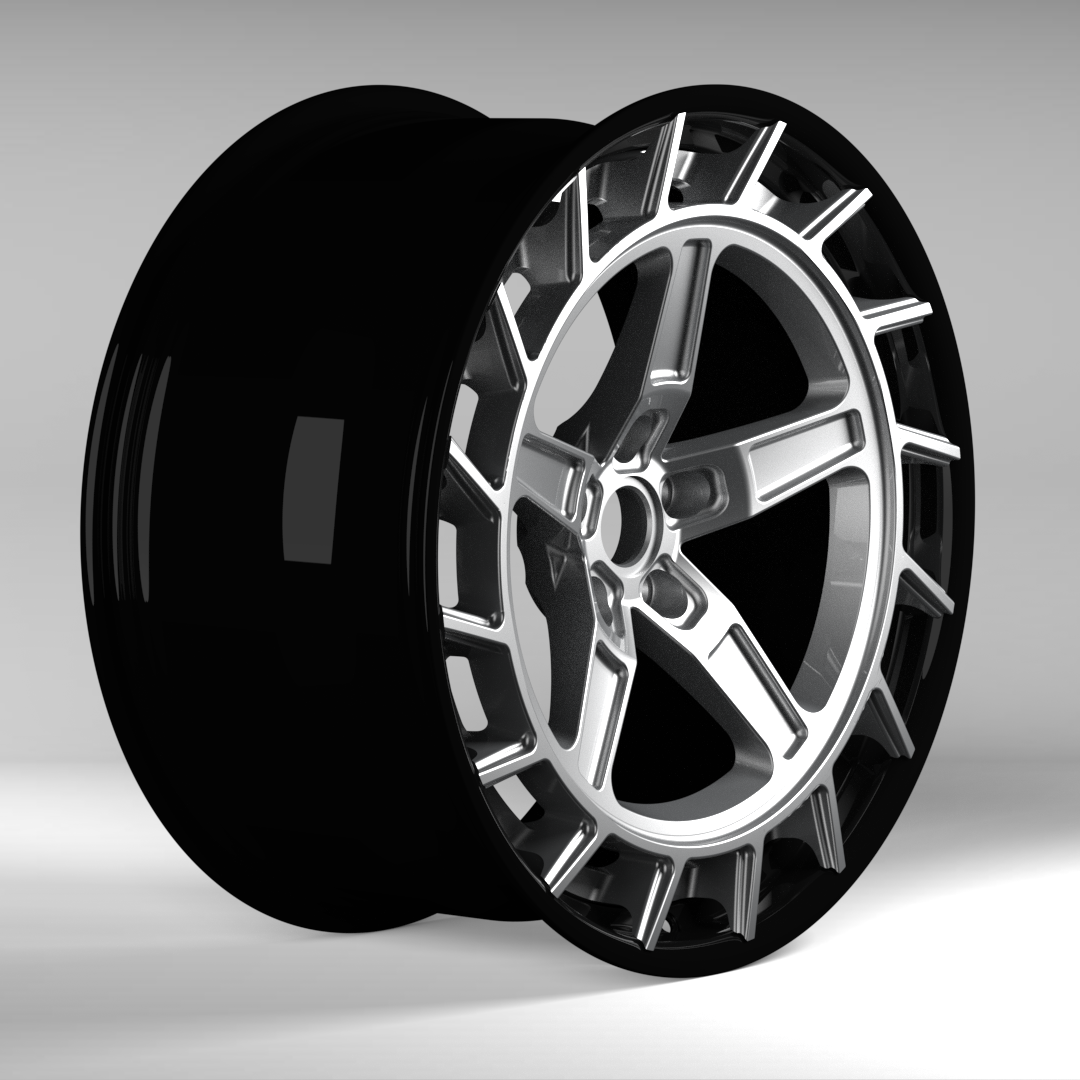 Black alloy wheel on a gray background