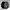 Black alloy wheel on a gray background