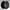 Black alloy wheel on a gray background