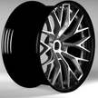 Car wheel rim with black and silver finish on a gray background