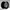 Black alloy wheel on a gray background